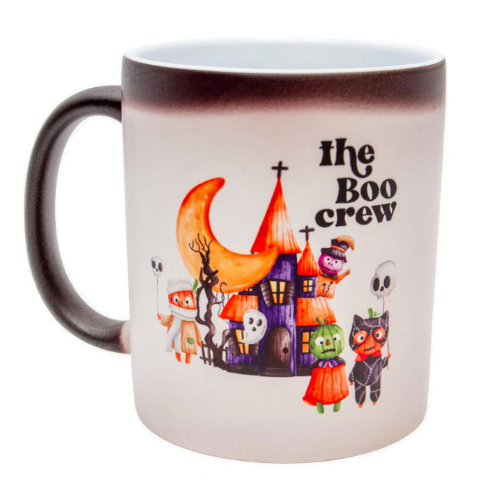 11oz matte black colour changing mugs, part-changed to white, showing a &