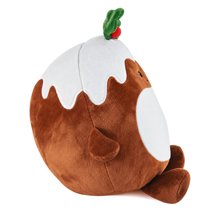 Side view of the Christmas Pudding plush toy, showing the white icing and holly with red berries