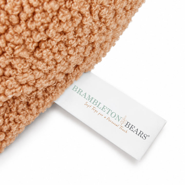 Brambleton Bears fabric label on the Gingerbread House sublimation cushion