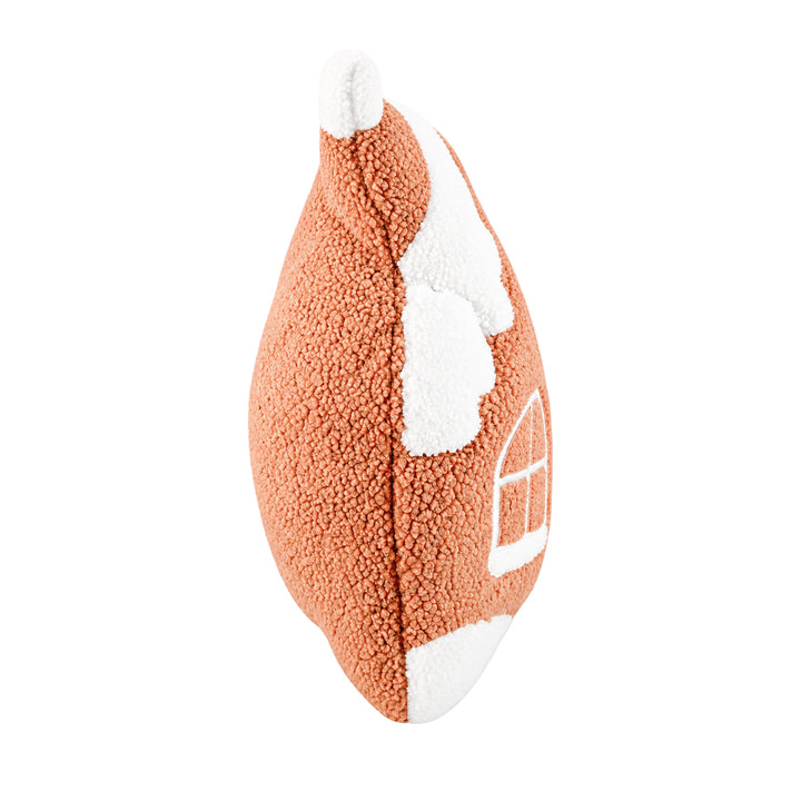 Side view of the Gingerbread House sublimation cushion, showing the curly teddy-style fabric 
