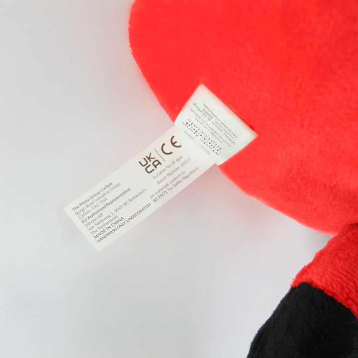 Santa plush toy safety label showing UKCA and CE marks and BS EN71 compliance