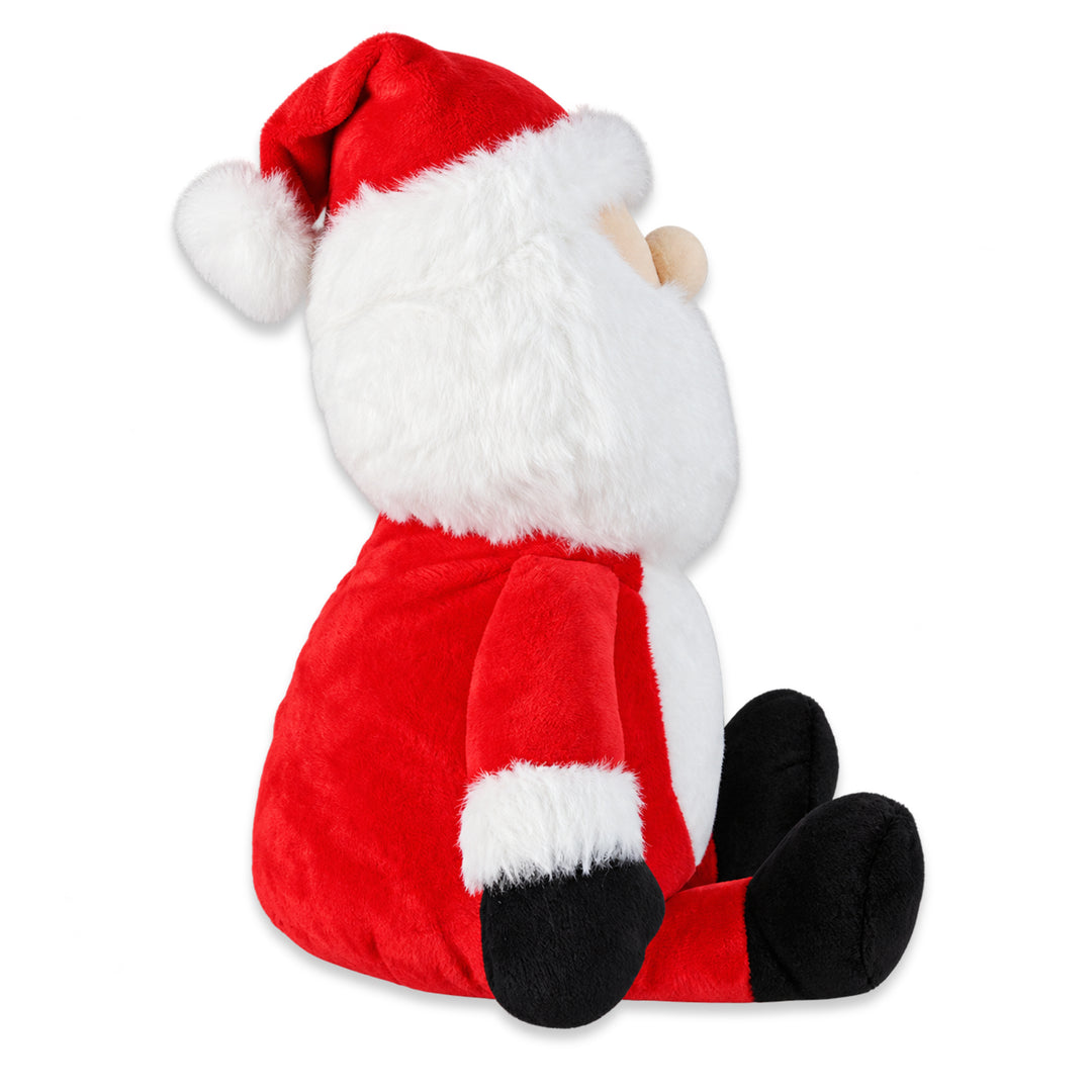 Side view of the Santa plush toy, showing the red hat, white trim and black boots