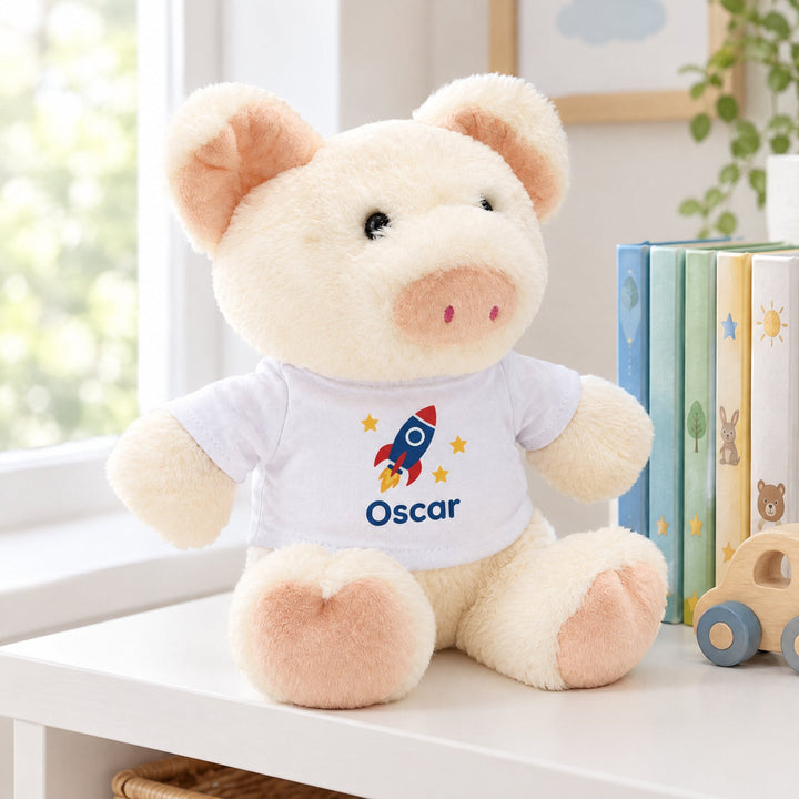 Large sublimation T-shirt for plush toy printed with illustrated rocket stars and the name Oscar, on a nursery shelf