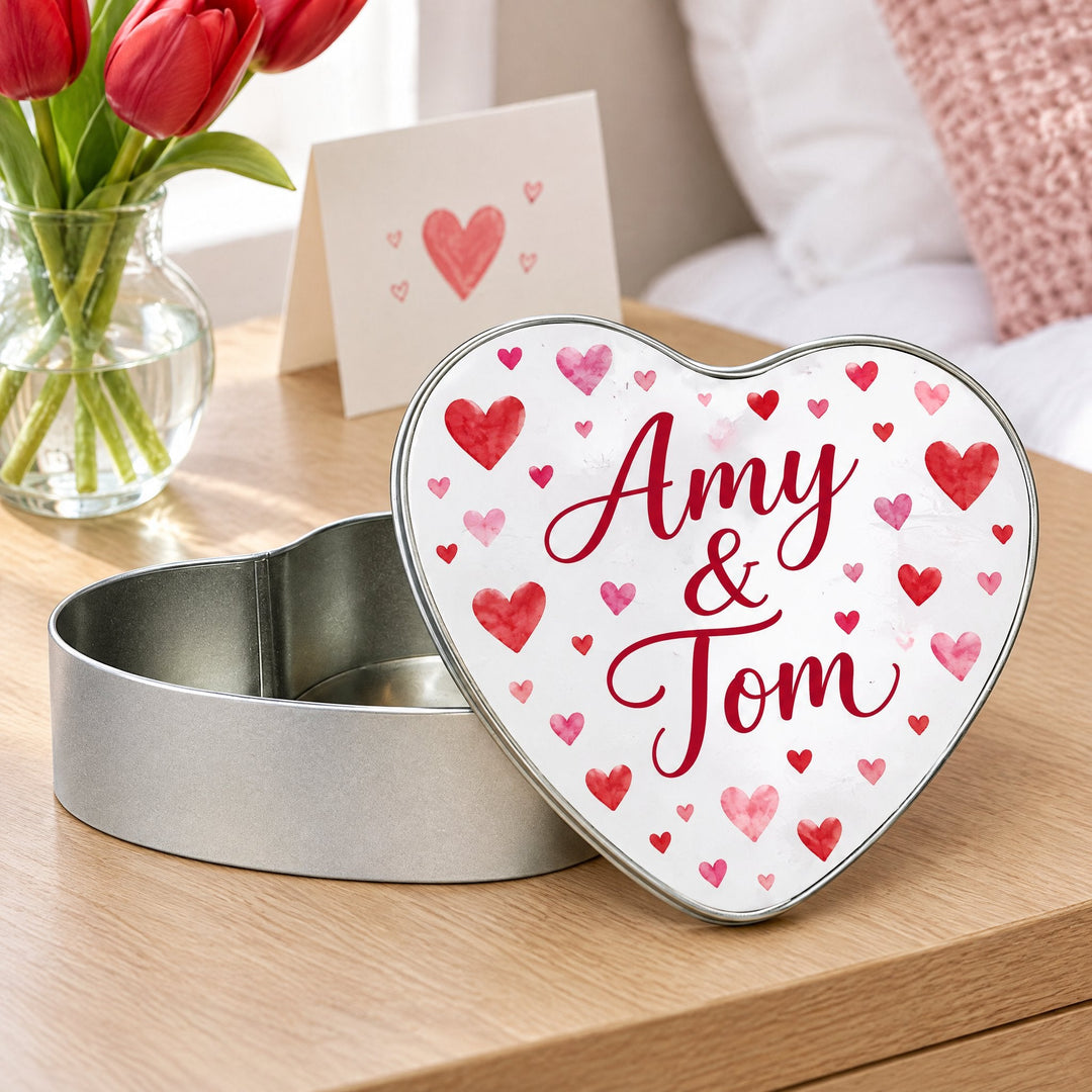 Spare insert for the Heart-Shaped metal tin printed with red and pink hearts, on a bedside table
