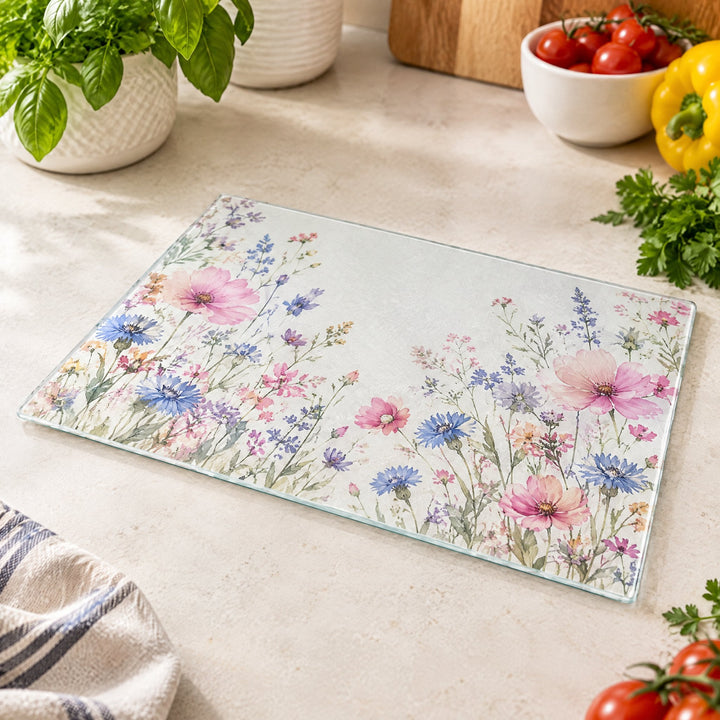 Sublimation A4 textured chopping boards printed with watercolour wildflowers, on a kitchen worktop