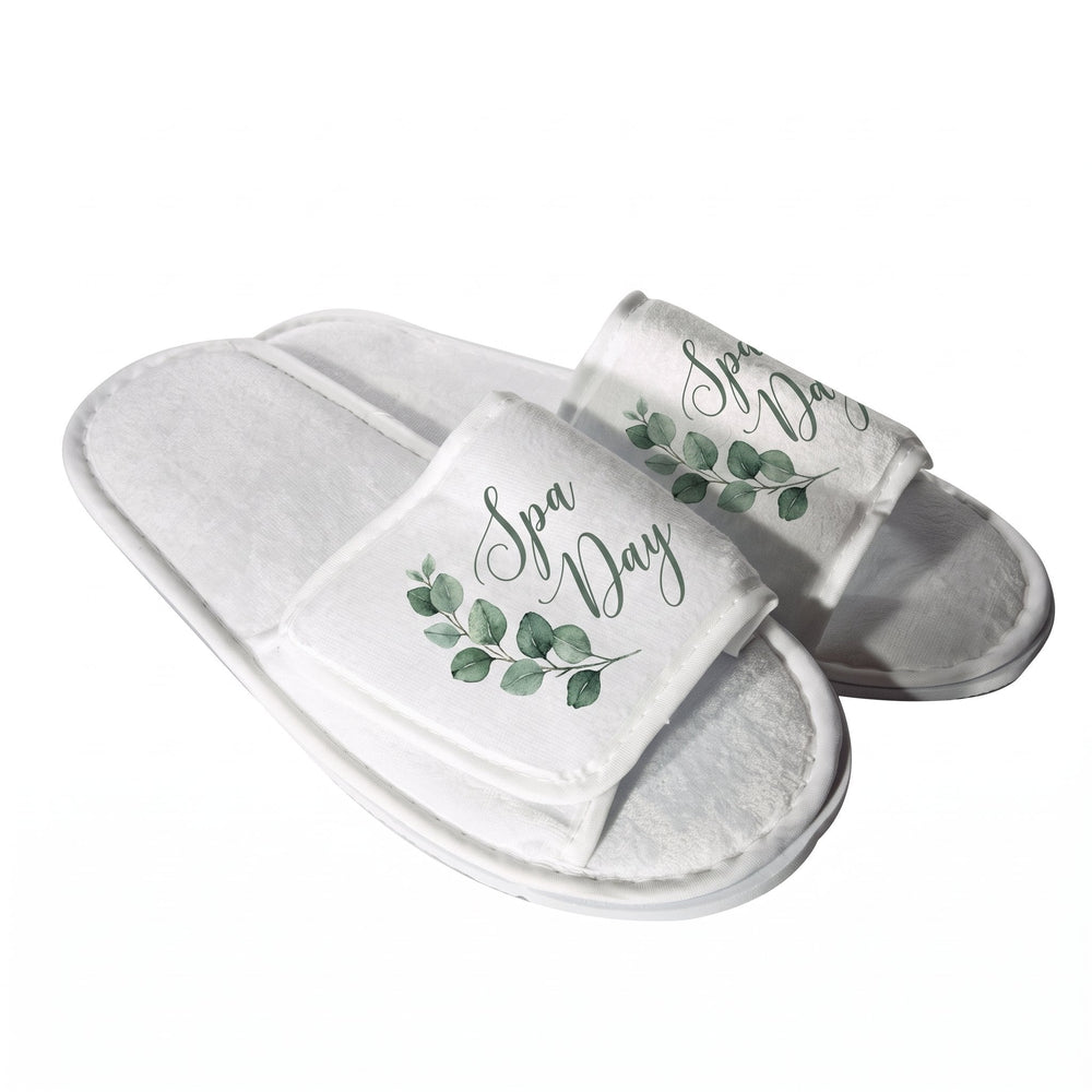 Sublimation hotel slippers printed with a watercolour eucalyptus sprig and the words 'Spa Day'